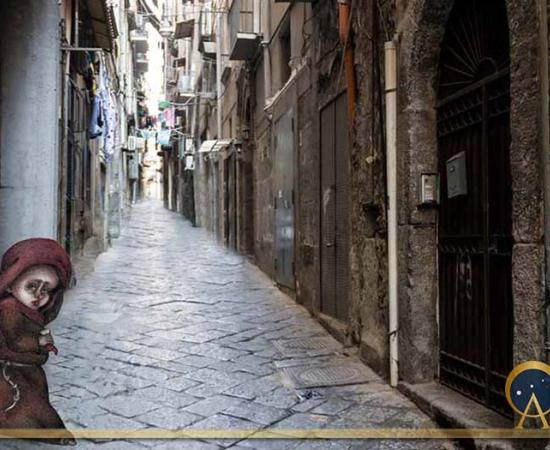 Scenic view of typical narrow alleyway lined laundry lines in the Medieval Centro Storico of Naples ( lazyllama/ Adobe Stock) and Munaciello according to popular imagery ( Lady of a times /CC BY-SA 4.0)