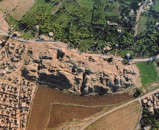 Aerial photo of the ancient Neolithic city of Jericho, adjacent to modern farms.
