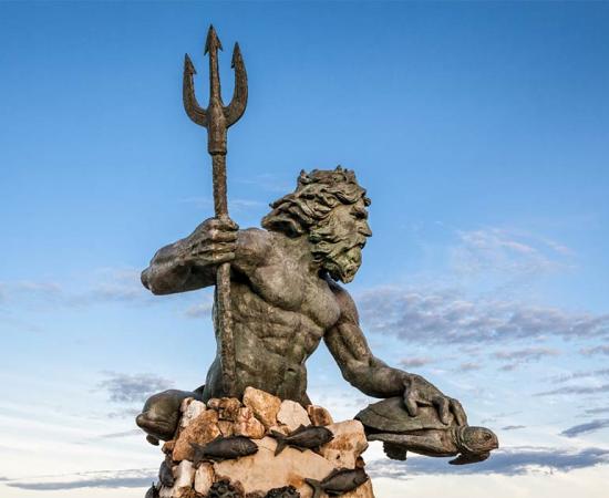 One of the many statues of Neptune, Roman god of fresh and sea water and more.    Source: eurobanks / Adobe Stock