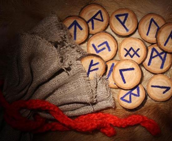 Runes close-up. The Swedish government is considering a ban on the runes and some ancient Norse symbols. Source: Pshenichka /Adobe
