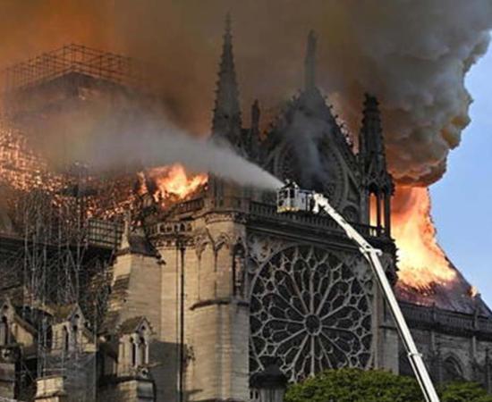 The Notre Dame Cathedral in Paris on fire.