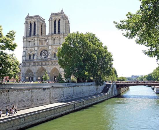 Landscape view of Notre Dame Cathedral in Paris from the River Seine.