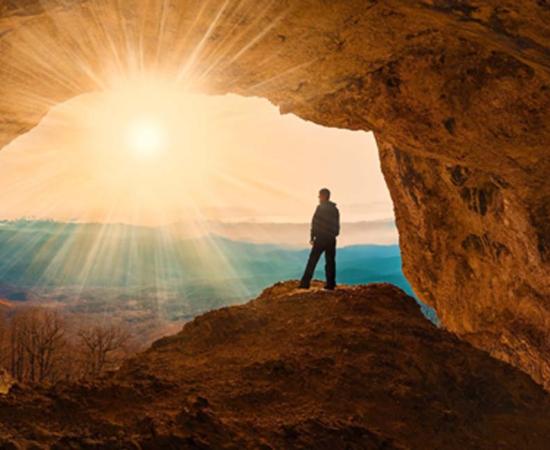 Cave entrance illustrating Nsongezi Rock Shelter is in Uganda