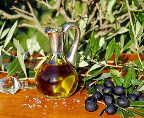 Modern glass carafe of olive oil. 