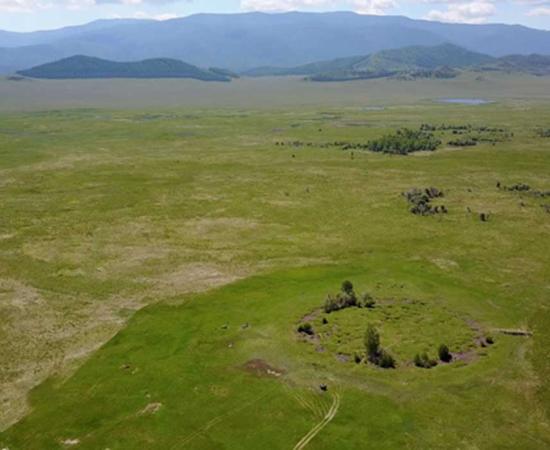 Aerial view of the burial mound Tunnug 1 (Arzhan 0). A distinct circle can be seen on one plane.