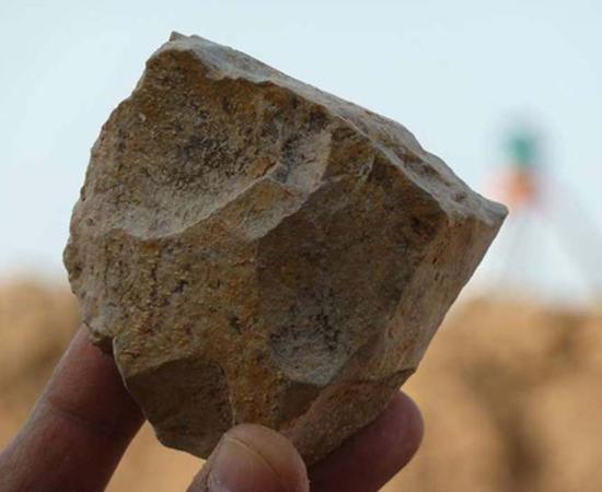 An Oldowan stone tool core freshly excavated at Ain Boucherit, Algeria.