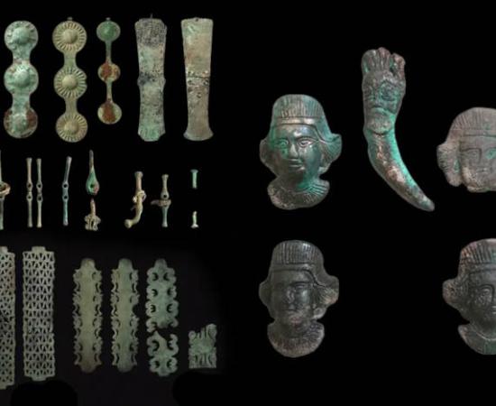 Bronze ritual artifacts including horse gear and ornamental plaques from the 4th-century BC sacrificial complex discovered at Vysokaya Mogila-Studenikin Mar, Orenburg Region.  