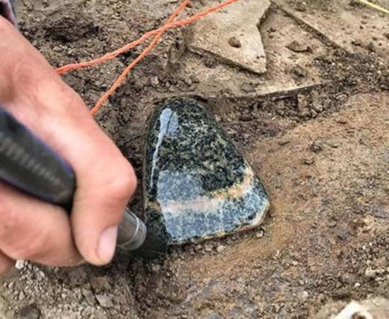 Gneiss stone axe found on the shores of Loch of Stenness.