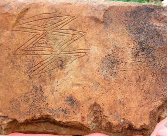 A closeup of the incisions on the Bay of Skaill stone recently found just next to Skara Brae