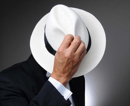Man wearing iconic “Panama hat,” which is actually an Ecuadorian toquilla or Montecristi hat. Source: Steve Cukrov / Adobe Stock 