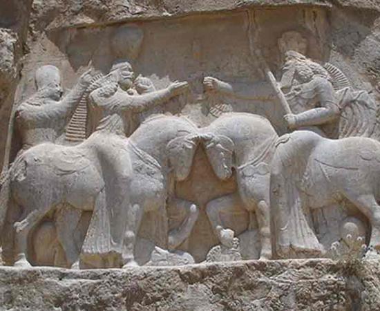 Bas relief at Nagsh-e-rostam showing the investiture of Ardashir I, Province du Fars, Iran. Source: Fabienkhan/CC BY-SA 2.5 