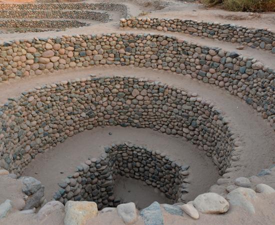 Ancient spiral aqueducts in Nazca, Peru. Source: peterz / Adobe Stock.