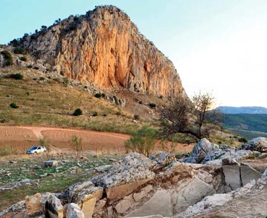 The Piedras Blancas tomb with La Peña de los Enamorados behind it. Source: M. Ángel Blanco de la Rubia / Antiquity Publications Ltd