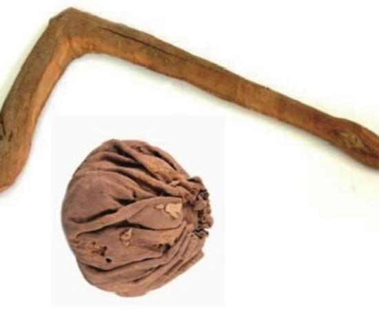 An ancient ball and polo mallet from the Yanghai Tombs 