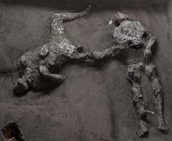 The casts of two men, believed to be a master and his young slave, have been unearthed in the excavation of a villa outside Pompeii. Source: Parco Archeologico di Pompei