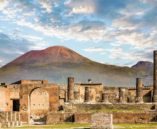 Archaeologists have unearthed “recycling sites” outside the walls of ancient Pompeii, showing the Pompeiians once recycled trash in an a very effective manner. Pictured: shot of the ruins with Mount Vesuvius in the background.      Source: dbvirago / Adobe stock