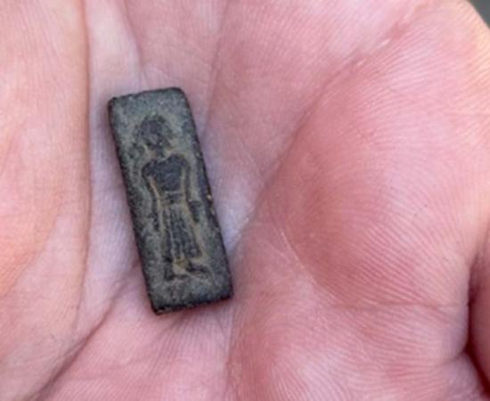 Just 2 centimeters in length, the Patrice, a Pre-Viking stamp, is believed to be a representation of a former royal power in Falster. Source: Lolland Falster Museum