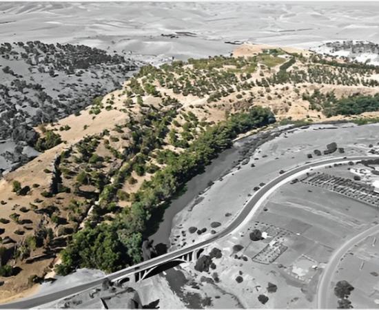 Aerial photograph of the Oued Beht ridge and river, highlighted in color. 
