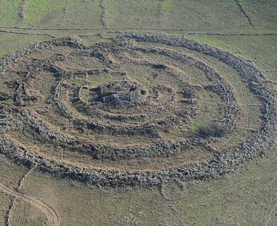 Megalithic stone circles of Rujm el-Hiri in the Golan Heights of Israel, constructed during the Early Bronze Age.
