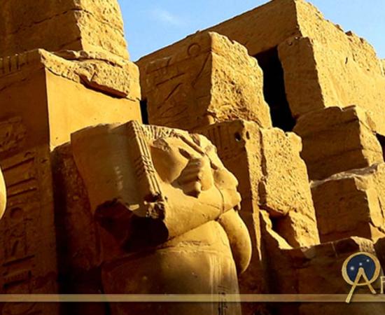 Enormous headless Osiride sculptures of Pharaoh Ramesses III stand in the colonnade of the king's Barque Chapel south of the second pylon at Karnak Temple; design by Anand Balaji (Photo credit: Anand Balaji); Deriv.