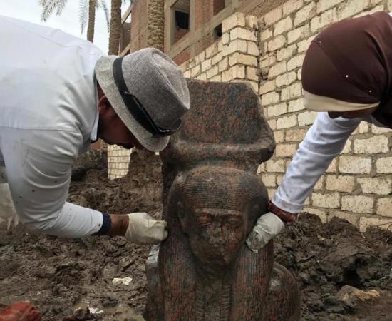 Pink granite statue of Ramses II uncovered in Giza.    Source: Ministry of Antiquities