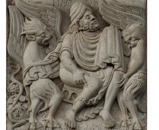 Relief on the Miègeville's gate of the basilica Saint-Sernin in Toulouse. The relief shows Simon magus, demons, and birth of the wine. 