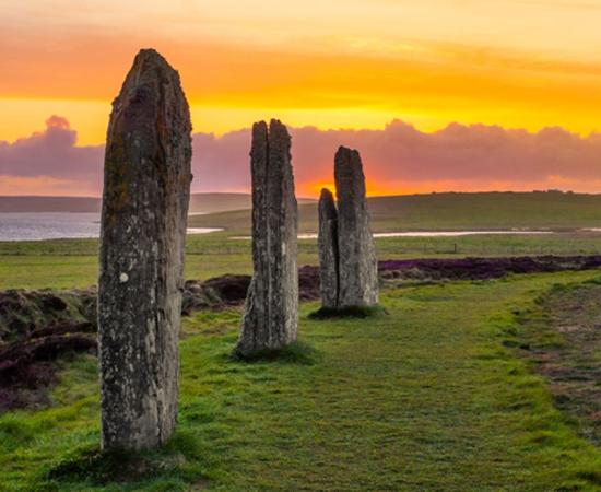 Three standing stones of the ancient and mysterious Ring of Brodgar (Oliver / Adobe Stock)