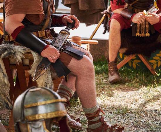Top image: Roman Soldiers at rest at a Roman camp.	Source: Андрей Журавлев/Adobe Stock