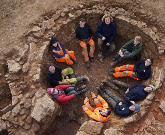 The Oxford Archaeology East team sat inside the lime kiln.    Source: Oxford Archaeology East
