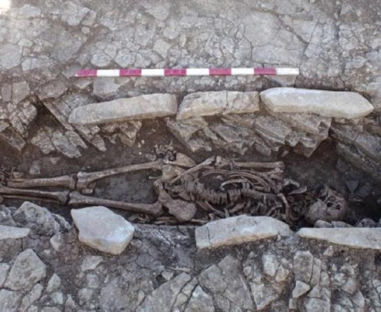 One of the skeletons in the stone coffin structure unearthed at the Roman burial site in Somerset.       Source: Wessex Archaeology