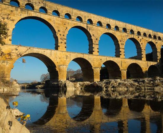 Roman Bridge Pont du Gard in France. Credit: JackF / Adobe Stock