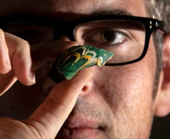 The fragment from the Roman fish bottle, the only one of its type ever discovered in Britain. Source: National Trust Images / Rod Kirkpatrick