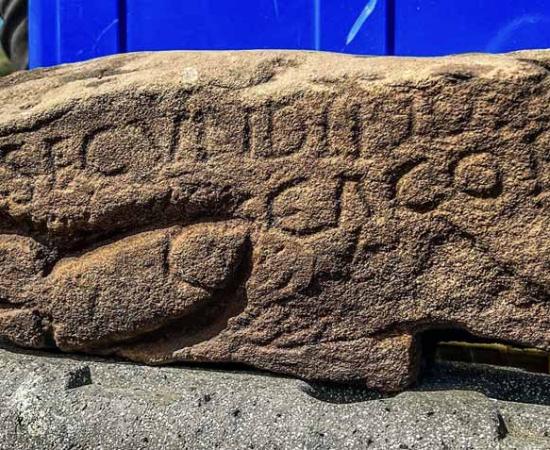 This phallus has insulting Roman graffiti above it that was meant for another Roman soldier. The insult reads: “You shi**r!”	Source: Vindolanda Charitable Trust