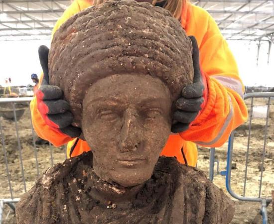 Complete bust of female Roman statue discovered at the site of old St Mary’s church in Stoke Mandeville, Buckinghamshire, England. Source: HS2