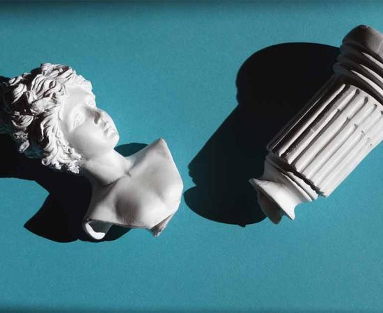 Broken Roman statue. Source: Dmitry / Adobe Stock.