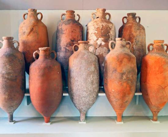 A new multidisciplinary study has looked at Roman winemaking from the ground up through the analysis of residues found at the bottom three Roman wine amphorae. A group of amphorae recovered from the sea off the coast of Tuscany, Italy. Source: Salvatore / Adobe Stock