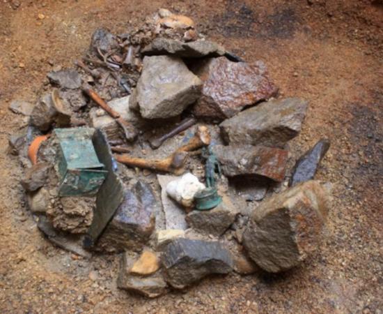 A well yielded a bronze statuette of the goddess Diana, a dedicatory inscription to Mercury Alatheus, and a human skeleton