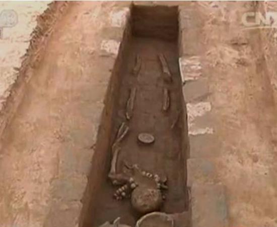 A well-preserved skeleton in one of the 18 tombs that had several types of grave goods in the Ruins of Yin, an area called the Chinese cradle of civilization. 