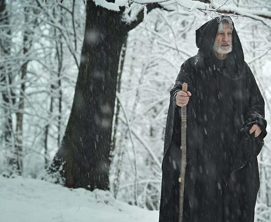 A pilgrim in the snow (captblack76 / Adobe Stock)