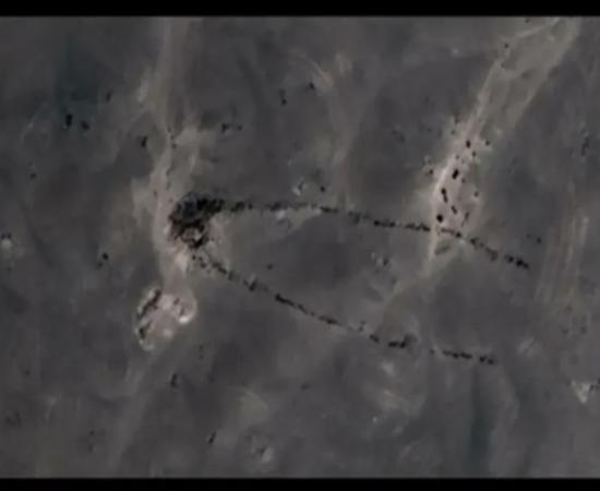 Aerial view of the excavated monument (tumulus, antennae and satellite stone mound).