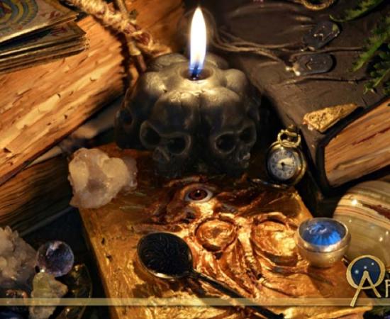 Ancient Sorcery: Antique witch book, black candle and ritual objects.