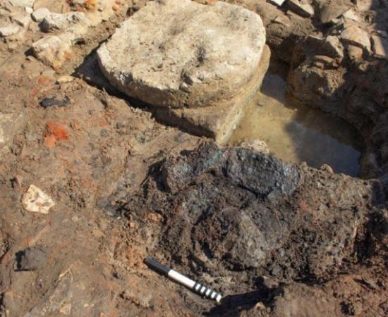 Close-up of the charred bronze sheets found at the Samikon temple excavation