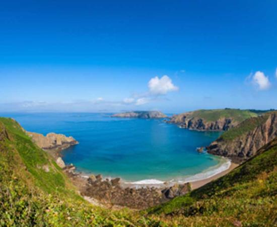 Remote beach and rocky coastline on Sark Island. Source: allard1 / Adobe Stock.