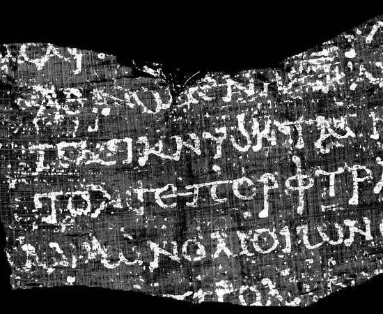 Scientists revealed an ancient Greek text from a carbonized Herculaneum scroll using high-resolution scanning and artificial intelligence