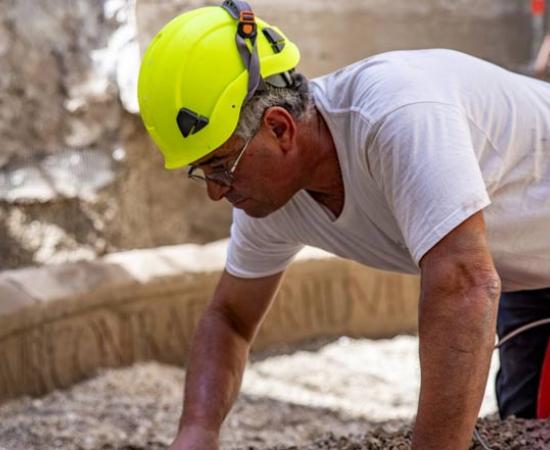 Semicircular tomb in Pompeii being excavated.	Source: Pompeii Archaeological Site