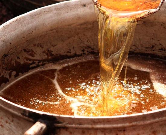 Shea butter making in Ghana. Source: nomadphotographs / Adobe Stock.