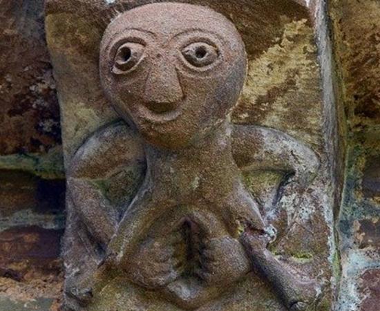 An example of a Sheela na gig, a carving of a naked woman with an exaggerated vulva. 