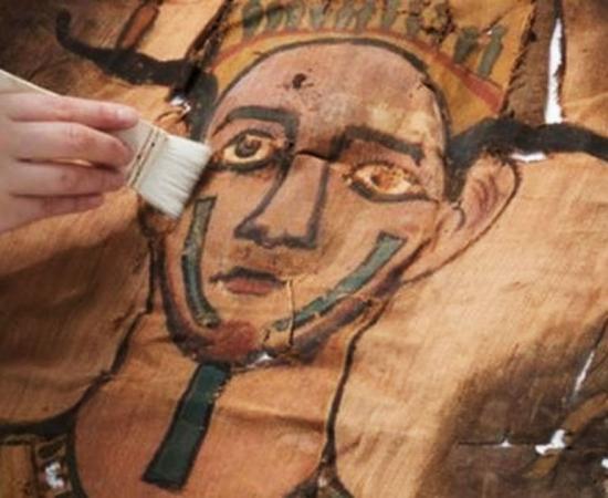 Detail of the face on the mummy shroud from around 9 BC which was recently recovered from a hidden package in the National Museum of Scotland’s collections.