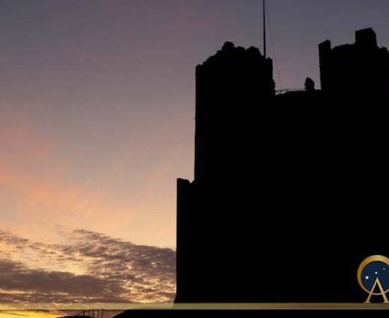 Sunset silhouette of Orford castle in Suffolk (Steve Mann / Adobe Stock)