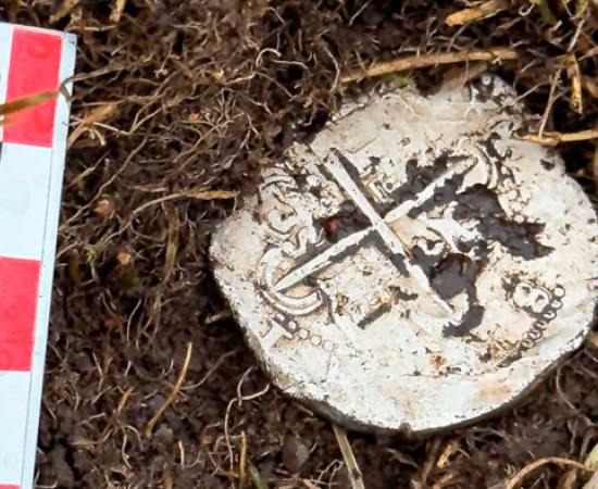 The silver Port Famine coin.